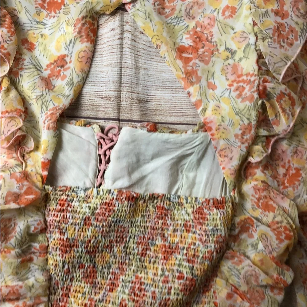 Free People Mabel Fairy Sheet printed ruched‎ blouse with a floral pattern